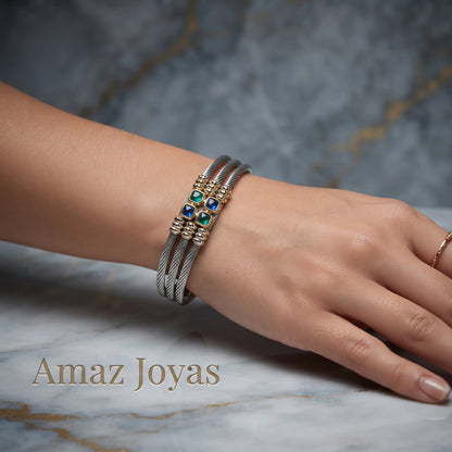 Brazalete de acero y oro con piedras azules y verdes